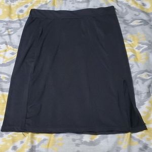 Black mini skirt with slit